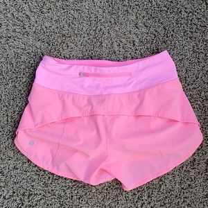 Selling a size 4 tall Lululemon neon pink shorts